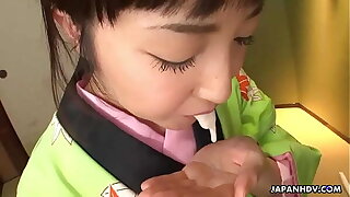 Asian protest in a kimono sucking exposed to his erect stab